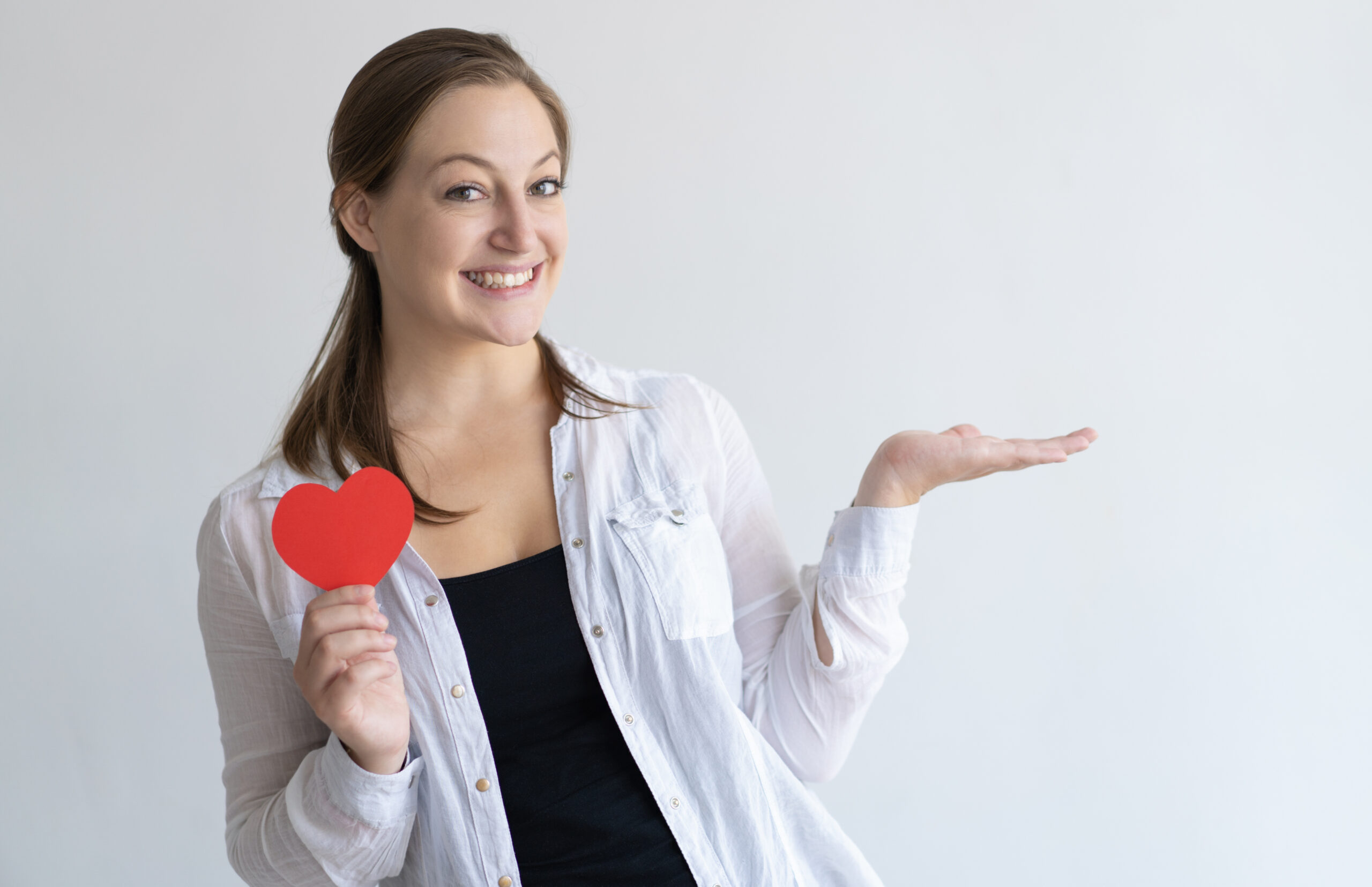 https://lifecarecosgyn.com/wp-content/uploads/2026/02/smiling-pretty-woman-holding-paper-heart-empty-space-scaled.jpg